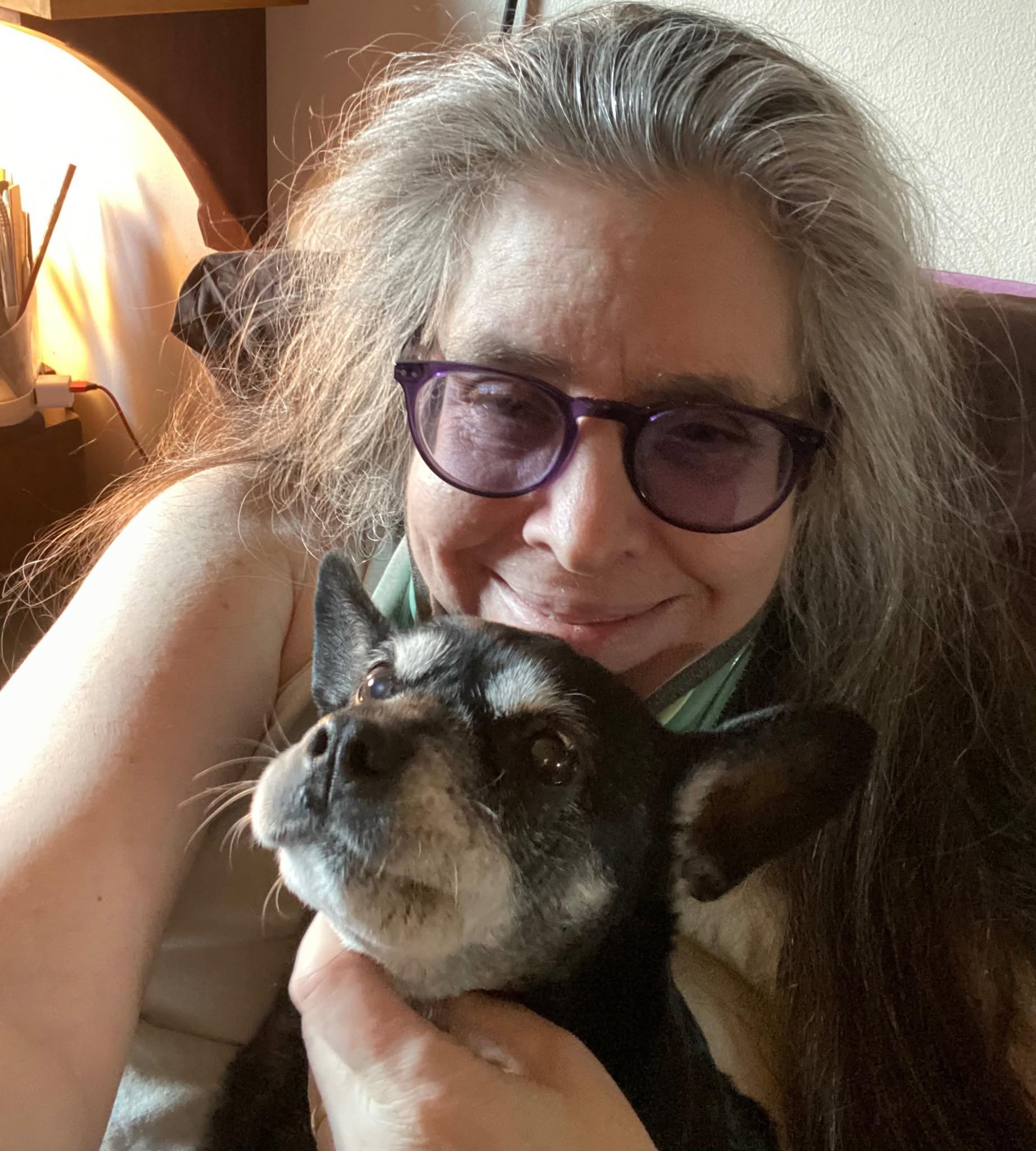 Portrait of R. K. Aanstad with one of her dogs